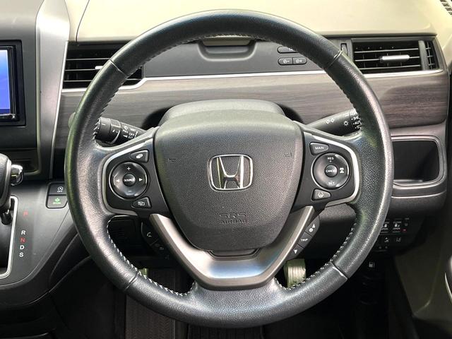 フリード Ｇ・ホンダセンシング　禁煙車　ＳＤナビ　バックカメラ　両側パワースライドドア　アダプティブクルーズコントロール　スマートキー　純正革巻きステアリング　ＬＥＤヘッドライト　純正１５インチアルミ　オートエアコン　ＥＴＣ（12枚目）