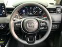 e:HEV Z 登録済未使用車 9インチホンダコネクトディスプレイ 全周囲カメラ ETC2.0 電動リアゲート パドルシフト LEDヘッド フルセグTV 置くだけ充電 スマートキー シートヒーター オートライト(11枚目)