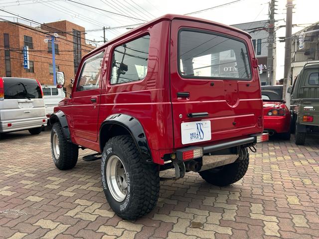 ジムニー 4WD ターボ ETC ドラレコ 社外15インチアルミ M/Tタイヤ リフトアップ 社外マフラー 社外ステアリング 社外F.Rバンパー(6枚目)