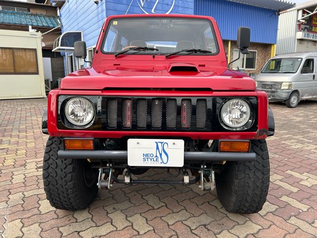 ジムニー 4WD ターボ ETC ドラレコ 社外15インチアルミ M/Tタイヤ リフトアップ 社外マフラー 社外ステアリング 社外F.Rバンパー(9枚目)