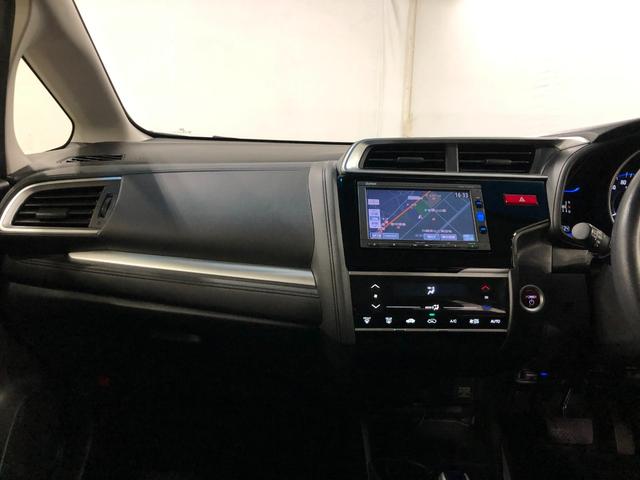 フィットハイブリッド Ｆパッケージ　走行５２４７１キロ／ワンセグナビ／バックカメラ　１年保証距離無制限　走行距離５２４７１キロ　ワンセグナビ　バックカメラ　ブルートゥース　純正マット　サイドエアバッグ　電動格納式ドアミラー　プッシュスタート（6枚目）