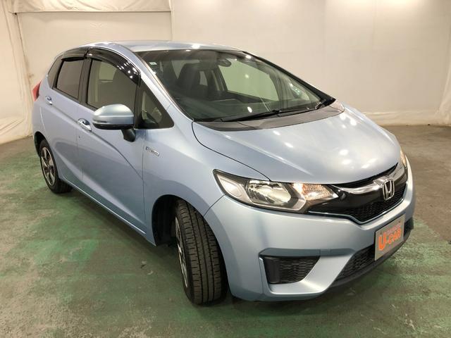 フィットハイブリッド Ｆパッケージ　走行５２４７１キロ／ワンセグナビ／バックカメラ　１年保証距離無制限　走行距離５２４７１キロ　ワンセグナビ　バックカメラ　ブルートゥース　純正マット　サイドエアバッグ　電動格納式ドアミラー　プッシュスタート（9枚目）