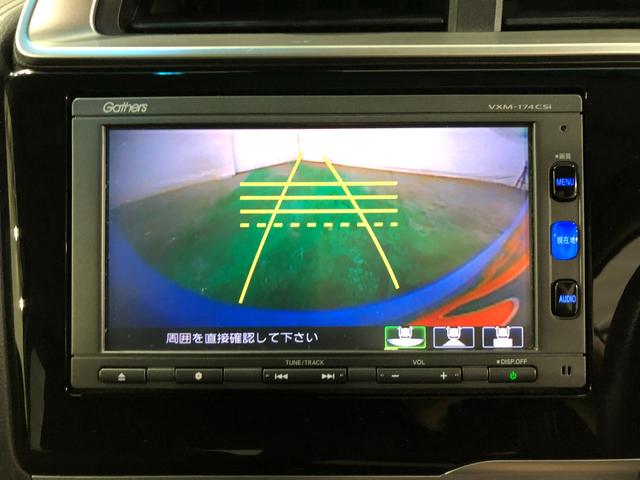 フィットハイブリッド Ｆパッケージ　走行５２４７１キロ／ワンセグナビ／バックカメラ　１年保証距離無制限　走行距離５２４７１キロ　ワンセグナビ　バックカメラ　ブルートゥース　純正マット　サイドエアバッグ　電動格納式ドアミラー　プッシュスタート（10枚目）