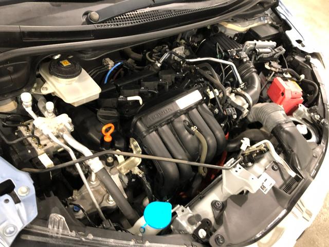フィットハイブリッド Ｆパッケージ　走行５２４７１キロ／ワンセグナビ／バックカメラ　１年保証距離無制限　走行距離５２４７１キロ　ワンセグナビ　バックカメラ　ブルートゥース　純正マット　サイドエアバッグ　電動格納式ドアミラー　プッシュスタート（19枚目）