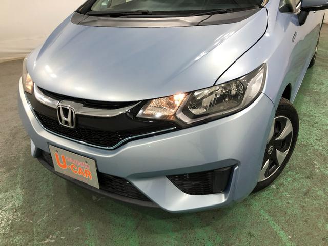 フィットハイブリッド Ｆパッケージ　走行５２４７１キロ／ワンセグナビ／バックカメラ　１年保証距離無制限　走行距離５２４７１キロ　ワンセグナビ　バックカメラ　ブルートゥース　純正マット　サイドエアバッグ　電動格納式ドアミラー　プッシュスタート（23枚目）