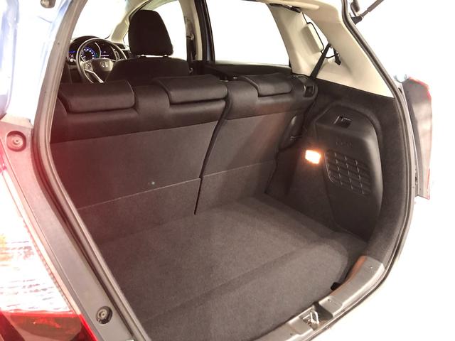 フィットハイブリッド Ｆパッケージ　走行５２４７１キロ／ワンセグナビ／バックカメラ　１年保証距離無制限　走行距離５２４７１キロ　ワンセグナビ　バックカメラ　ブルートゥース　純正マット　サイドエアバッグ　電動格納式ドアミラー　プッシュスタート（27枚目）