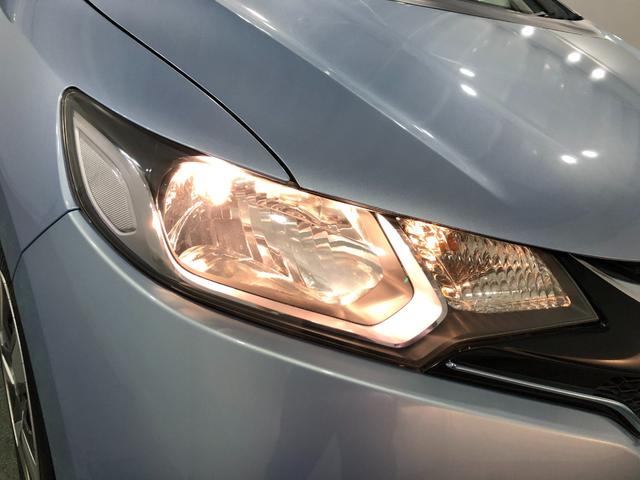 フィットハイブリッド Ｆパッケージ　走行５２４７１キロ／ワンセグナビ／バックカメラ　１年保証距離無制限　走行距離５２４７１キロ　ワンセグナビ　バックカメラ　ブルートゥース　純正マット　サイドエアバッグ　電動格納式ドアミラー　プッシュスタート（28枚目）