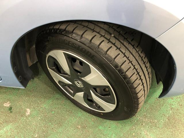 フィットハイブリッド Ｆパッケージ　走行５２４７１キロ／ワンセグナビ／バックカメラ　１年保証距離無制限　走行距離５２４７１キロ　ワンセグナビ　バックカメラ　ブルートゥース　純正マット　サイドエアバッグ　電動格納式ドアミラー　プッシュスタート（30枚目）