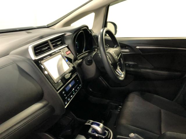 フィットハイブリッド Ｆパッケージ　走行５２４７１キロ／ワンセグナビ／バックカメラ　１年保証距離無制限　走行距離５２４７１キロ　ワンセグナビ　バックカメラ　ブルートゥース　純正マット　サイドエアバッグ　電動格納式ドアミラー　プッシュスタート（31枚目）