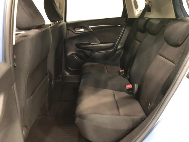 フィットハイブリッド Ｆパッケージ　走行５２４７１キロ／ワンセグナビ／バックカメラ　１年保証距離無制限　走行距離５２４７１キロ　ワンセグナビ　バックカメラ　ブルートゥース　純正マット　サイドエアバッグ　電動格納式ドアミラー　プッシュスタート（34枚目）