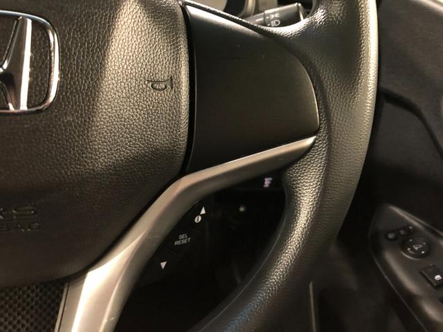 フィットハイブリッド Ｆパッケージ　走行５２４７１キロ／ワンセグナビ／バックカメラ　１年保証距離無制限　走行距離５２４７１キロ　ワンセグナビ　バックカメラ　ブルートゥース　純正マット　サイドエアバッグ　電動格納式ドアミラー　プッシュスタート（50枚目）