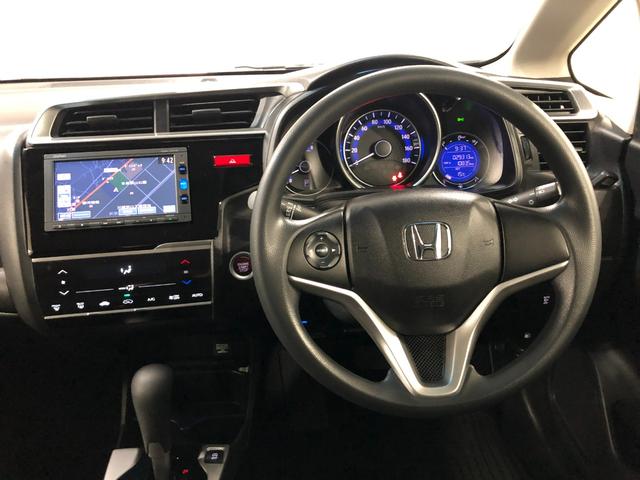 フィット 13G・Fパッケージ ファインエディション ナビ/Bカメラ 1年保証距離無制限 走行距離29313キロ ワンセグナビ バックカメラ 純正マット 助手席エアバッグ プッシュボタンスタート 電動格納式ドアミラー(5枚目)