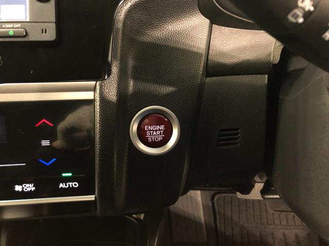 フィット 13G・Fパッケージ ファインエディション ナビ/Bカメラ 1年保証距離無制限 走行距離29313キロ ワンセグナビ バックカメラ 純正マット 助手席エアバッグ プッシュボタンスタート 電動格納式ドアミラー(11枚目)