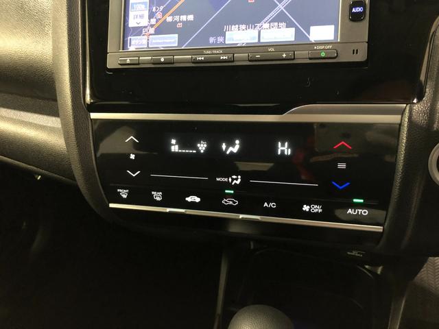 フィット 13G・Fパッケージ ファインエディション ナビ/Bカメラ 1年保証距離無制限 走行距離29313キロ ワンセグナビ バックカメラ 純正マット 助手席エアバッグ プッシュボタンスタート 電動格納式ドアミラー(51枚目)