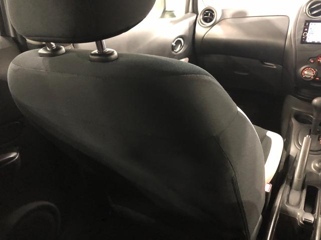 ノート Ｘ　走行２９２４８キロ／雹害／ナビ／全周囲カメラ　一年保証・走行距離無制限走行２９２４８キロ　フルセグナビ　ブルートゥース　全周囲カメラ　ＤＶＤ　オートライト　キーフリー　ホイールキャップ（38枚目）