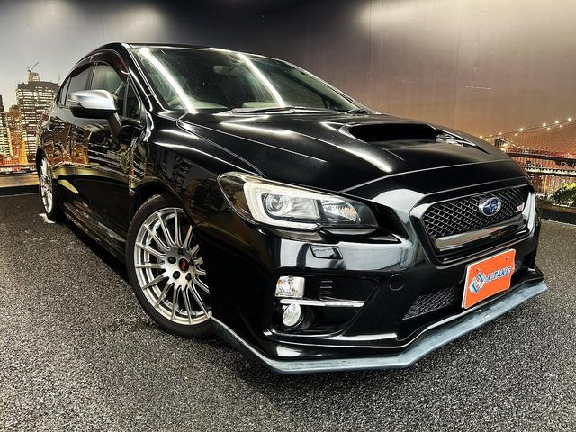 WRX STI STI (禁煙車)(6速MT)(ターボ)(4WD)(社外SDナビ)(黒/赤ハーフレザーシート)(ETC)(ローダウン)(スマートキー&プッシュスタート)(純正18インチAW)(17枚目)
