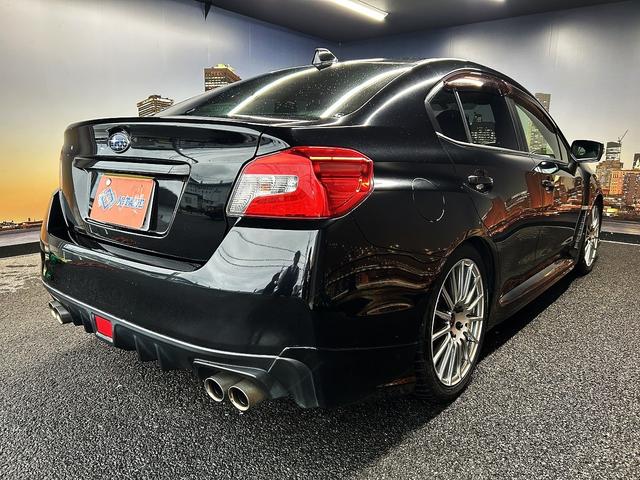 WRX STI STI (禁煙車)(6速MT)(ターボ)(4WD)(社外SDナビ)(黒/赤ハーフレザーシート)(ETC)(ローダウン)(スマートキー&プッシュスタート)(純正18インチAW)(19枚目)