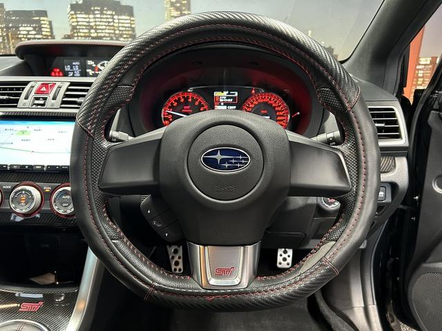 WRX STI STI (禁煙車)(6速MT)(ターボ)(4WD)(社外SDナビ)(黒/赤ハーフレザーシート)(ETC)(ローダウン)(スマートキー&プッシュスタート)(純正18インチAW)(28枚目)