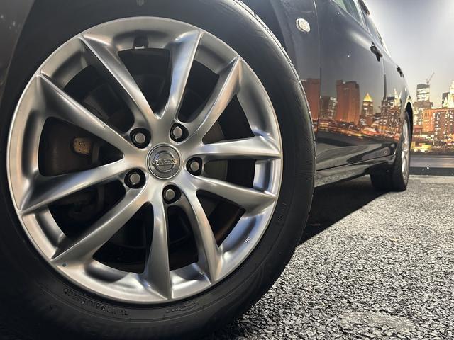 スカイライン 250GT (禁煙車)(黒ハーフレザー)(メーカーHDDナビ)(サイド・バックカメラ)(ETC)(HIDヘッドライト)(スマートキー)(パワーシート)(ミュージックサーバー)(オートライト)(純正17インチAW)(36枚目)