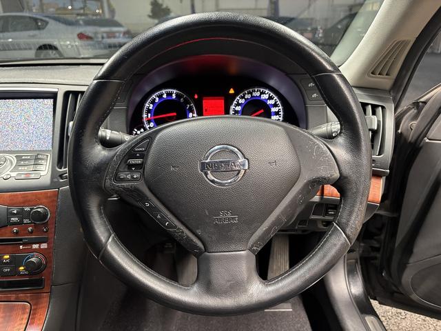 スカイライン 250GT (禁煙車)(黒ハーフレザー)(メーカーHDDナビ)(サイド・バックカメラ)(ETC)(HIDヘッドライト)(スマートキー)(パワーシート)(ミュージックサーバー)(オートライト)(純正17インチAW)(42枚目)