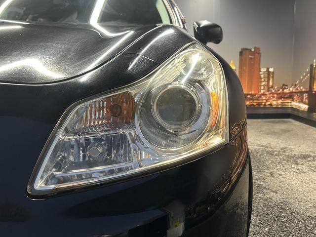 スカイライン 250GT (禁煙車)(黒ハーフレザー)(メーカーHDDナビ)(サイド・バックカメラ)(ETC)(HIDヘッドライト)(スマートキー)(パワーシート)(ミュージックサーバー)(オートライト)(純正17インチAW)(50枚目)