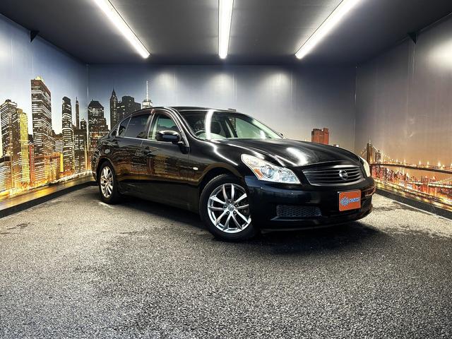 スカイライン 250GT (禁煙車)(黒ハーフレザー)(メーカーHDDナビ)(サイド・バックカメラ)(ETC)(HIDヘッドライト)(スマートキー)(パワーシート)(ミュージックサーバー)(オートライト)(純正17インチAW)(52枚目)