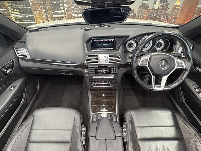 Eクラス E250カブリオレ AMGスポーツパッケージ(禁煙車)(後期型)(黒本革シート)(メーカーHDDナビ)(レーダークルーズ)(コーナーセンサー)(アラウンドビューモニター)(シートヒーター)(BSM)(純正18インチAW)(5枚目)