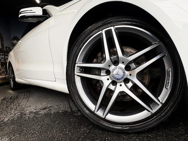 Eクラス E250カブリオレ AMGスポーツパッケージ(禁煙車)(後期型)(黒本革シート)(メーカーHDDナビ)(レーダークルーズ)(コーナーセンサー)(アラウンドビューモニター)(シートヒーター)(BSM)(純正18インチAW)(14枚目)