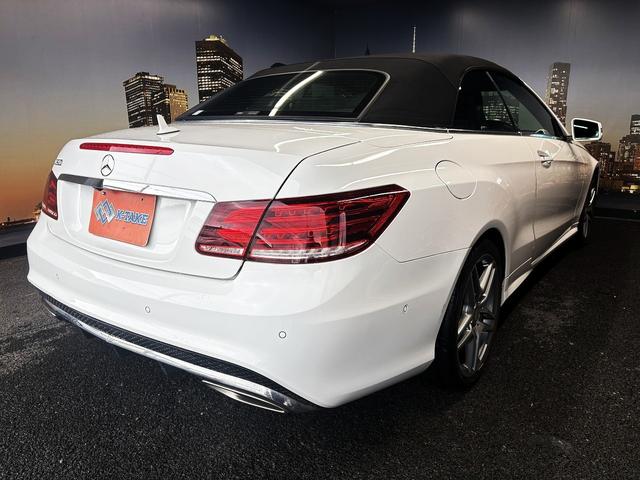 Eクラス E250カブリオレ AMGスポーツパッケージ(禁煙車)(後期型)(黒本革シート)(メーカーHDDナビ)(レーダークルーズ)(コーナーセンサー)(アラウンドビューモニター)(シートヒーター)(BSM)(純正18インチAW)(22枚目)