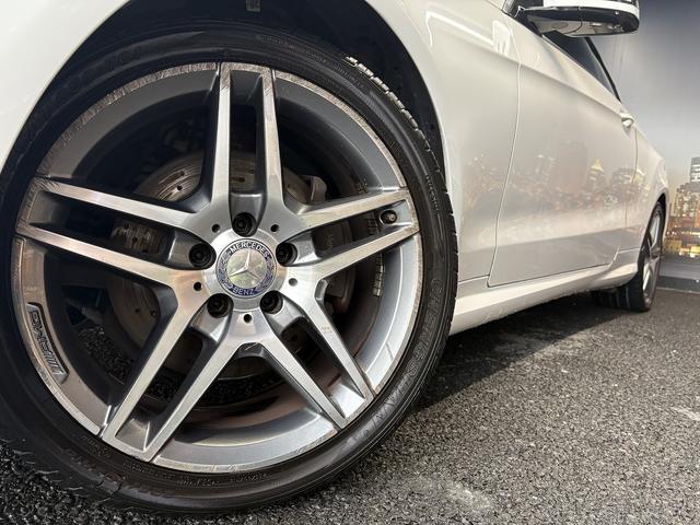 Eクラス E250カブリオレ AMGスポーツパッケージ(禁煙車)(後期型)(黒本革シート)(メーカーHDDナビ)(レーダークルーズ)(コーナーセンサー)(アラウンドビューモニター)(シートヒーター)(BSM)(純正18インチAW)(32枚目)