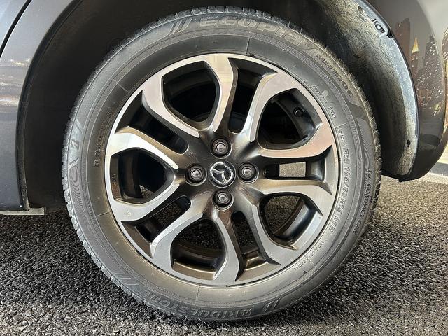 デミオ XDツーリング (禁煙車)(6速MT)(メーカーSDナビ)(クルコン)(LEDヘッドライト)(オートライト)(スマートキー)(フルセグ)(ETC)(Bluetoothオーディオ)(HUD)(純正16インチAW)(56枚目)