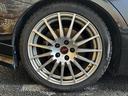 STI (禁煙車)(6速MT)(ターボ)(4WD)(社外SDナビ)(黒/赤ハーフレザーシート)(ETC)(ローダウン)(スマートキー&プッシュスタート)(純正18インチAW)(11枚目)