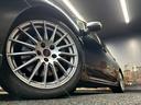 STI (禁煙車)(6速MT)(ターボ)(4WD)(社外SDナビ)(黒/赤ハーフレザーシート)(ETC)(ローダウン)(スマートキー&プッシュスタート)(純正18インチAW)(26枚目)