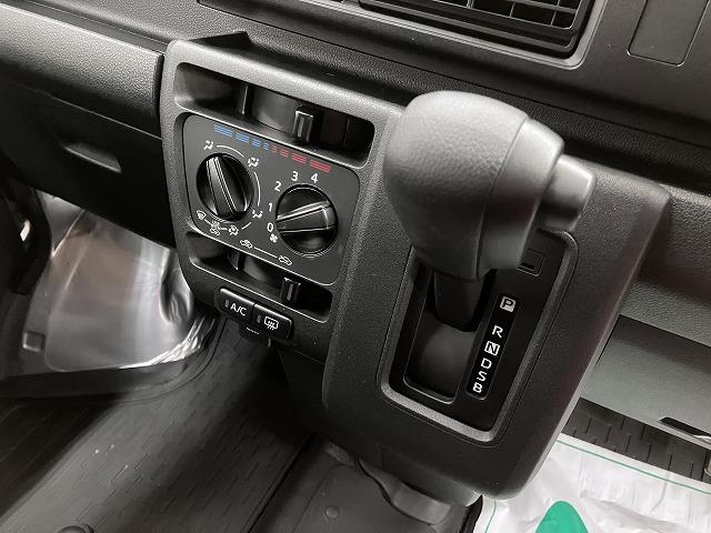 ハイゼットカーゴ ＤＸ　サポカーＳワイド適合　ラジオ　エアコン　アクセサリーソケット　コーナーセンサー　アイドリングストップ　光軸調整ダイヤル　横滑り防止機能　誤発進抑制機能　パワーウインドウ　キーレス（14枚目）