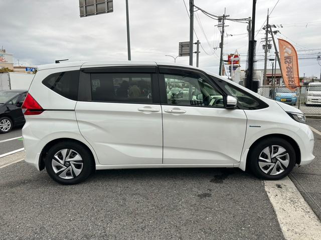 フリードハイブリッド ハイブリッド・Ｇホンダセンシング　両側電動スライドドア　クルーズコントロール　バックカメラ　Ｂｌｕｅｔｏｏｔｈオーディオ　　ＥＴＣ　ドライブレコーダー　オートライト　パワーウィンドウ　プッシュスタート　スマートキー（50枚目）