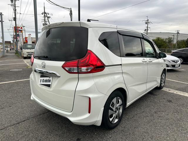 フリードハイブリッド ハイブリッド・Ｇホンダセンシング　両側電動スライドドア　クルーズコントロール　バックカメラ　Ｂｌｕｅｔｏｏｔｈオーディオ　　ＥＴＣ　ドライブレコーダー　オートライト　パワーウィンドウ　プッシュスタート　スマートキー（52枚目）