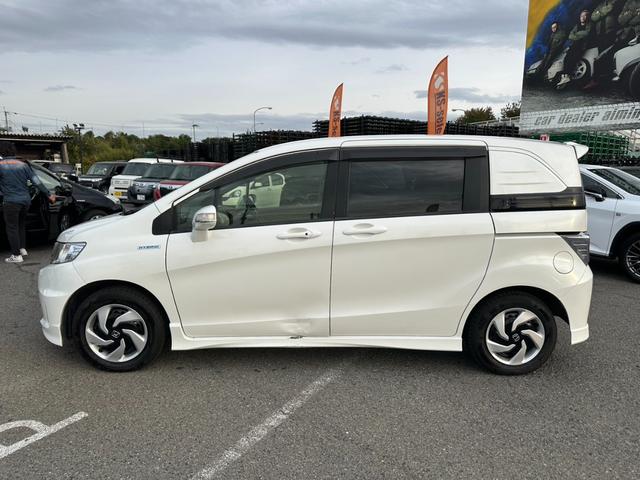 フリードスパイクハイブリッド ジャストセレクション ワンオーナー 両側電動スライドドア クルーズコントロール ETC バックカメラ ギャザーズナビ スマートキー オートライト Bluetoothオーディオ ステアリングスイッチ 電動格納ミラー(10枚目)