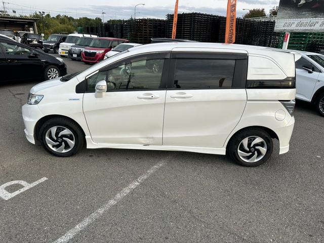 フリードスパイクハイブリッド ジャストセレクション ワンオーナー 両側電動スライドドア クルーズコントロール ETC バックカメラ ギャザーズナビ スマートキー オートライト Bluetoothオーディオ ステアリングスイッチ 電動格納ミラー(55枚目)