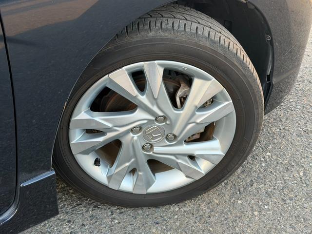 シャトル ハイブリッドＺ　バックカメラ　シートヒーター　クルーズコントロール　パドルシフト　オートライト　ＥＴＣ　純正アルミホイール　フロントフォグランプ　ステアリングスイッチ　パワーウィンドウ　プッシュスタート　スマートキー（68枚目）