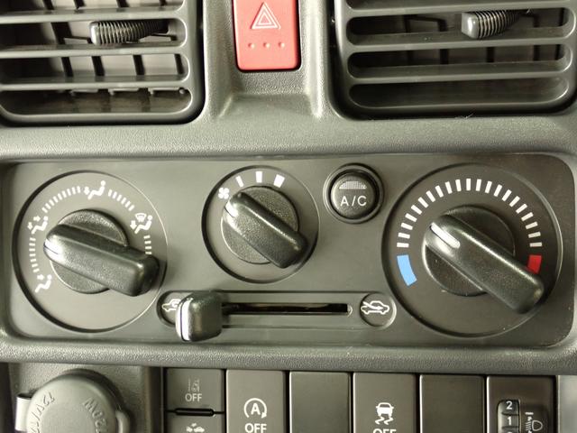 キャリイトラック KCエアコンパワステ 6型 4AT セーフティサポート装着車 2WD AM/FMラジオ 衝突被害軽減ブレーキ 車検整備付 車線逸脱警報機能 アイドリングストップ ハイビームアシスト マッドフラップ 誤発進抑制機能 マニュアルエアコン 運転席・助手席エアバック(13枚目)