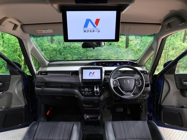 フリードハイブリッド ホンダ ハイブリッド ｅｘ 純正９型ナビ フリップダウンモニター モデューロエアロ 両側電動スライドドア アダプティブクルーズコントロール 衝突軽減装置 ｌｅｄヘッドライト ６人乗り 禁煙車 スマートキー 大阪府 ハイブリッド ｅｘ 純正９