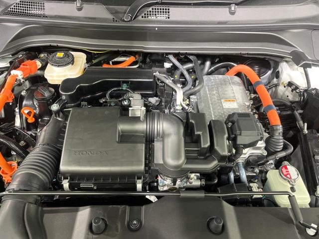 ヴェゼル ｅ：ＨＥＶ　Ｚ　登録済未使用車　純正９インチナビ　バックカメラ　ホンダセンシング　クリアランスナー　レーダークルーズコントロール　ステアリングヒーター　シートヒーター　スマートキー　パワーバックドア（18枚目）