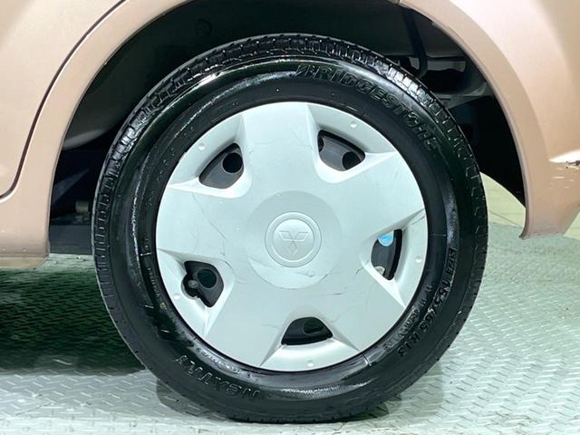 ｅＫワゴン ＭＸ　禁煙車　ＥＴＣ　純正１３インチスチールホイール　キーレス　ＣＤ　スペアタイヤ　ダイヤル式エアコン　オーディオ（12枚目）