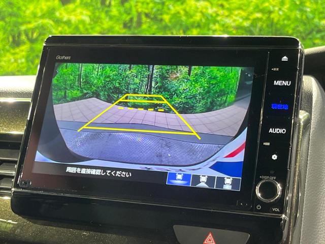 N-BOXカスタム G・Lホンダセンシング 純正8インチナビ バックカメラ ホンダセンシング スマートキー 片側パワースライドドア レーダークルーズコントロール オートエアコン シートヒーター ステアリングスイッチ(4枚目)