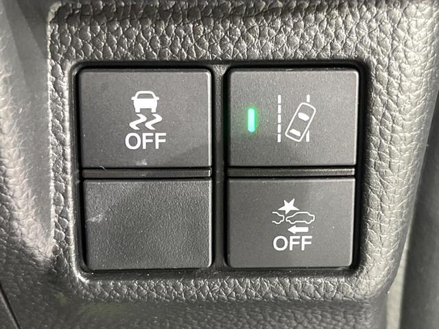 N-BOXカスタム G・Lホンダセンシング 純正8インチナビ バックカメラ ホンダセンシング スマートキー 片側パワースライドドア レーダークルーズコントロール オートエアコン シートヒーター ステアリングスイッチ(23枚目)