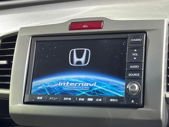 フリードハイブリッド ジャストセレクション 両側電動ドア 純正SDナビ バックカメラ 禁煙車 ハーフレザーシート スマートキー HIDヘッド ビルトインETC クルコン オートライト オートエアコン 純正15インチアルミ CD DVD再生(3枚目)