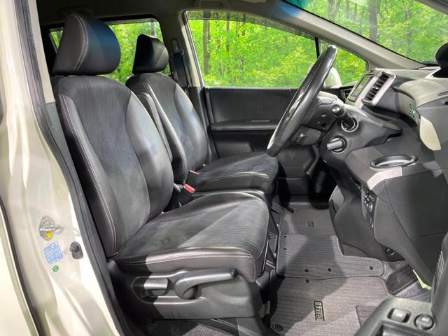 フリードハイブリッド ジャストセレクション 両側電動ドア 純正SDナビ バックカメラ 禁煙車 ハーフレザーシート スマートキー HIDヘッド ビルトインETC クルコン オートライト オートエアコン 純正15インチアルミ CD DVD再生(9枚目)