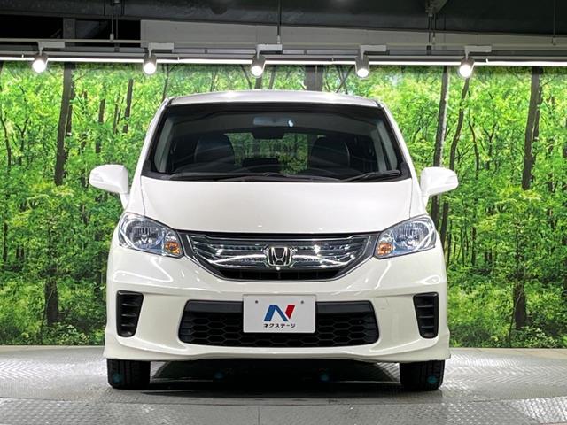 フリードハイブリッド ジャストセレクション 両側電動ドア 純正SDナビ バックカメラ 禁煙車 ハーフレザーシート スマートキー HIDヘッド ビルトインETC クルコン オートライト オートエアコン 純正15インチアルミ CD DVD再生(13枚目)