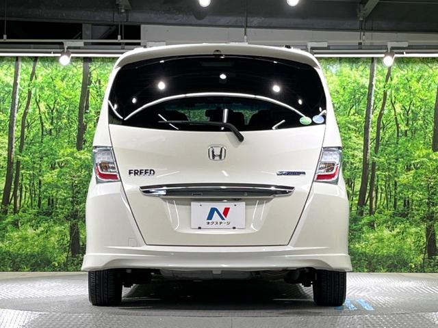 フリードハイブリッド ジャストセレクション 両側電動ドア 純正SDナビ バックカメラ 禁煙車 ハーフレザーシート スマートキー HIDヘッド ビルトインETC クルコン オートライト オートエアコン 純正15インチアルミ CD DVD再生(14枚目)