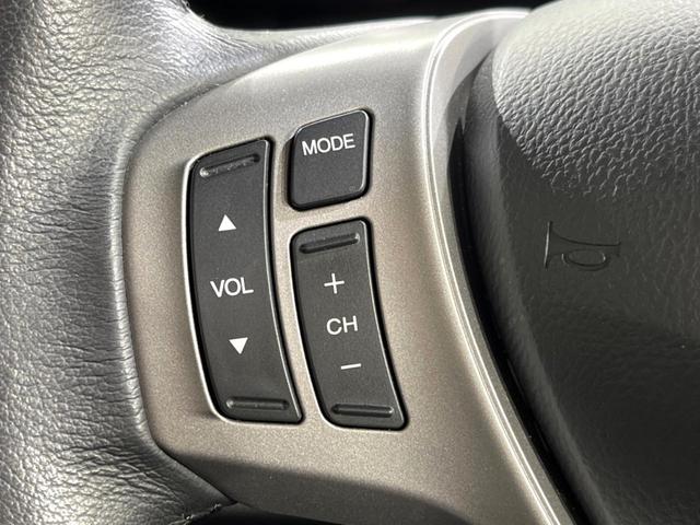 フリードハイブリッド ジャストセレクション 両側電動ドア 純正SDナビ バックカメラ 禁煙車 ハーフレザーシート スマートキー HIDヘッド ビルトインETC クルコン オートライト オートエアコン 純正15インチアルミ CD DVD再生(27枚目)